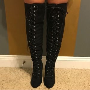 Knee high boots with laces